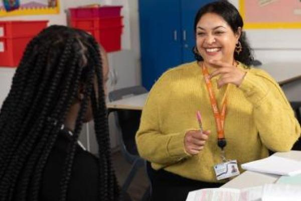 Tutor smiling at student